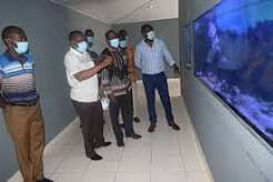 Visitors at an interactive marine science display